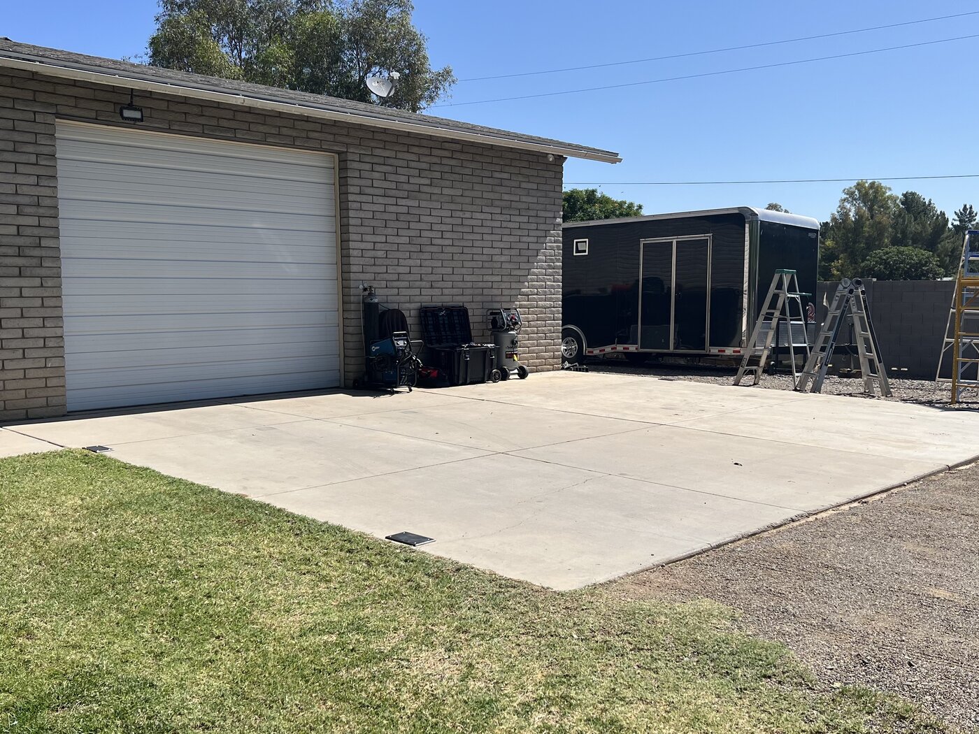 Empty concrete slab, before carport installation
